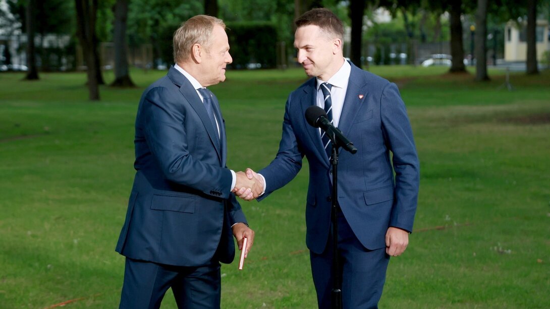 Donald Tusk i Adam Szłapka